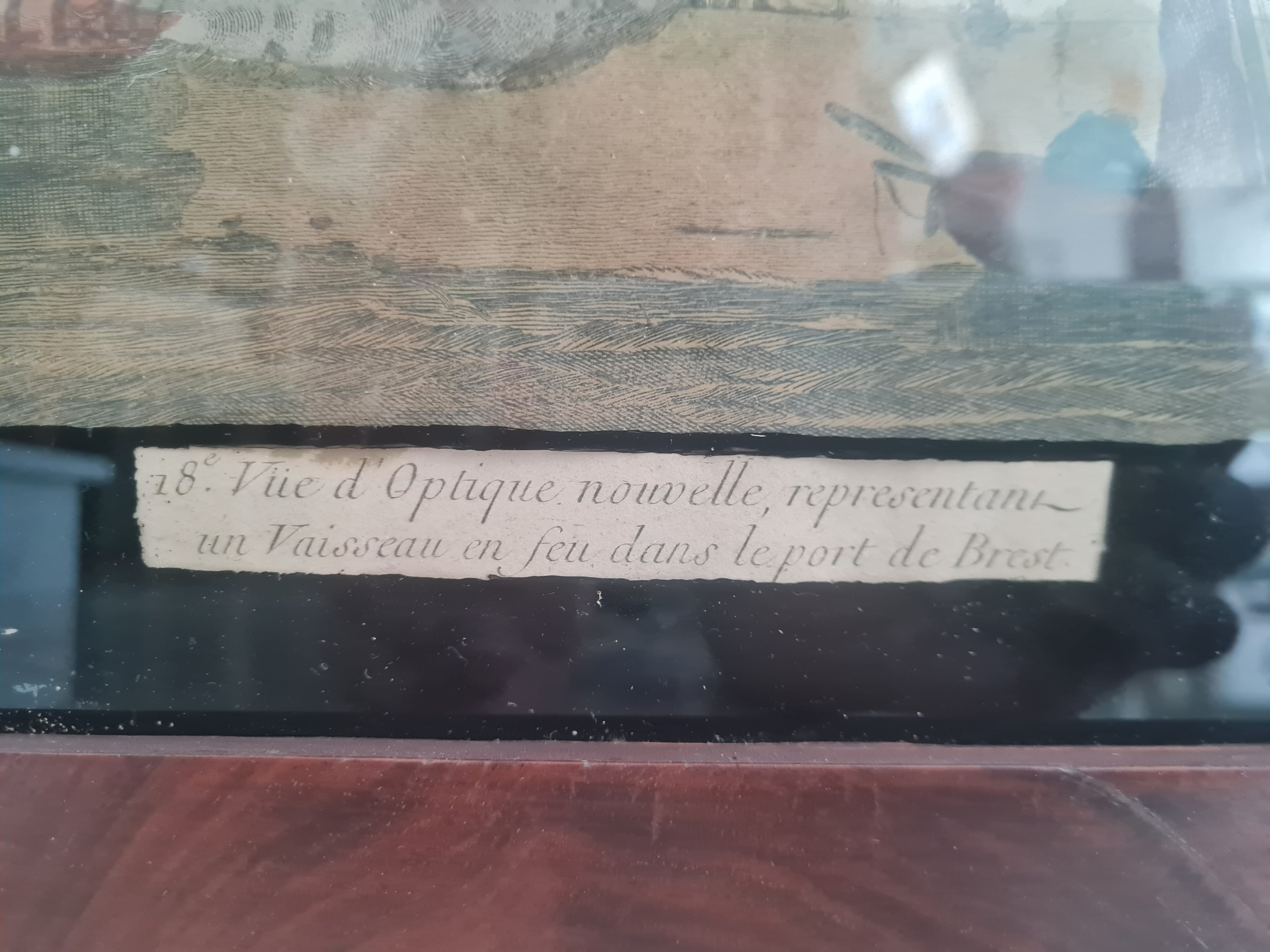 "Vue d'Optique nouvelle, representant un Vaisseau en feu dans le port de Brest" — No. 18 Hand-coloured etching with watercolour on laid paper — Paris, Chereau, c. 1793–1794